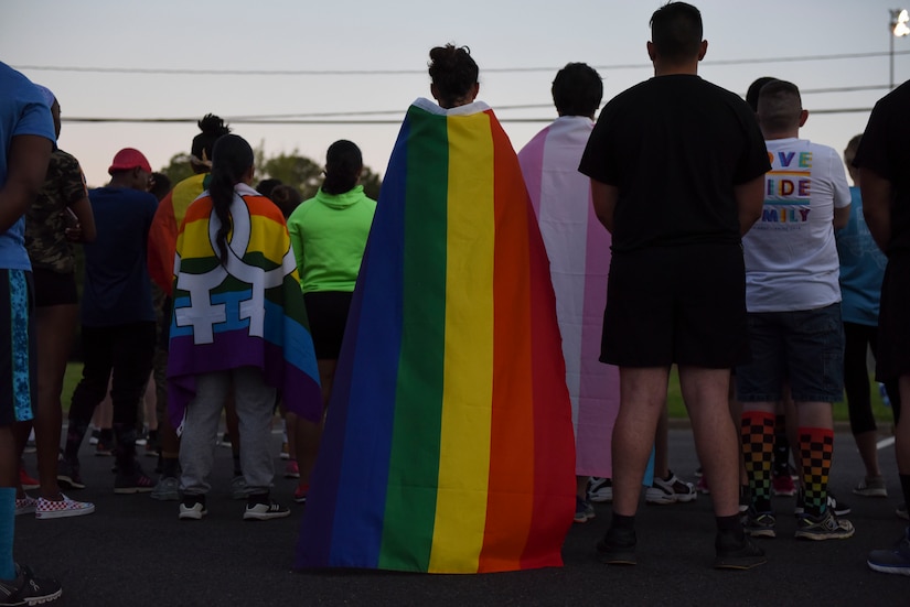 Runners display their rainbow attire during a Pride Observance Month 5K run at Joint Base Langley-Eustis, Virginia, June 21, 2019.