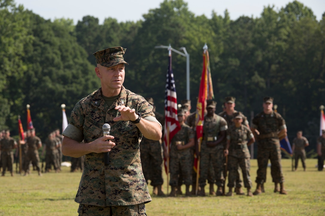 U.S. Marine Corps Col. Corey M. Collier, the incoming commanding officer of Marine Corps Security Force Regiment, U.S. Marine Corps Forces Command, gives remarks during a change of command ceremony at Naval Weapons Station Yorktown, Yorktown, Virginia, June 28, 2019. The change of command is a time-honored tradition where the responsibilities and authority of command are ceremoniously passed from one commander to the next. (U.S. Marine Corps photo by Sgt. Jessika Braden/ Released)