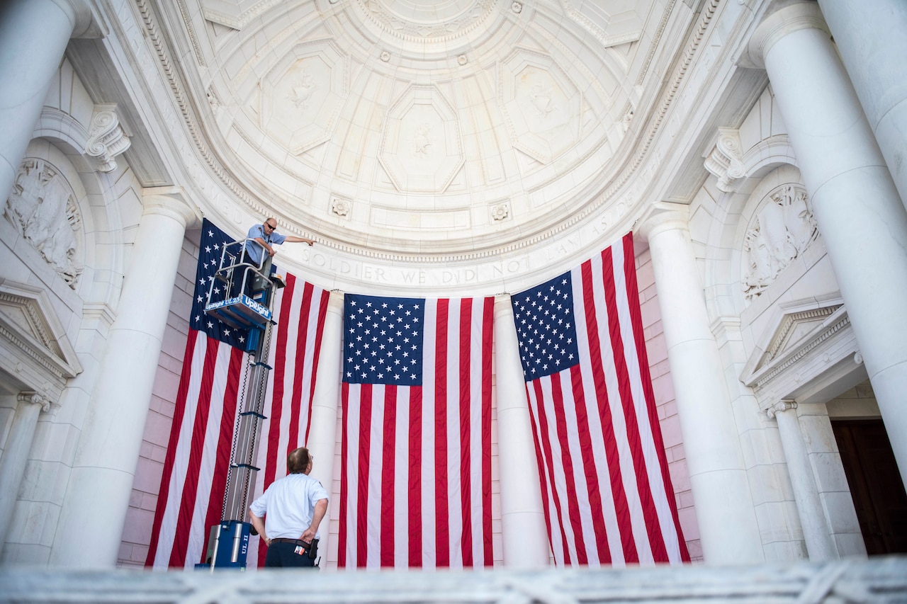 Flags are hung in the Memorial Amphitheater at Arlington National Cemetery.