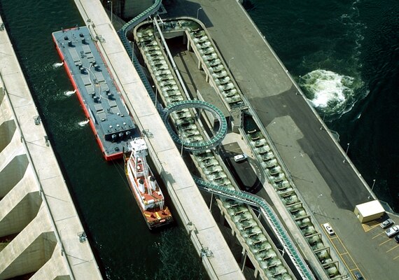 Adult fish passage facilities include one ladder with entrances on both shores and a fish channel through the spillway, which connects to the powerhouse fish collection system and south shore ladder. Modifications to improve adult Pacific Lamprey passage include ladder improvements, passage structures and installation of metal plating to assist lamprey upstream.