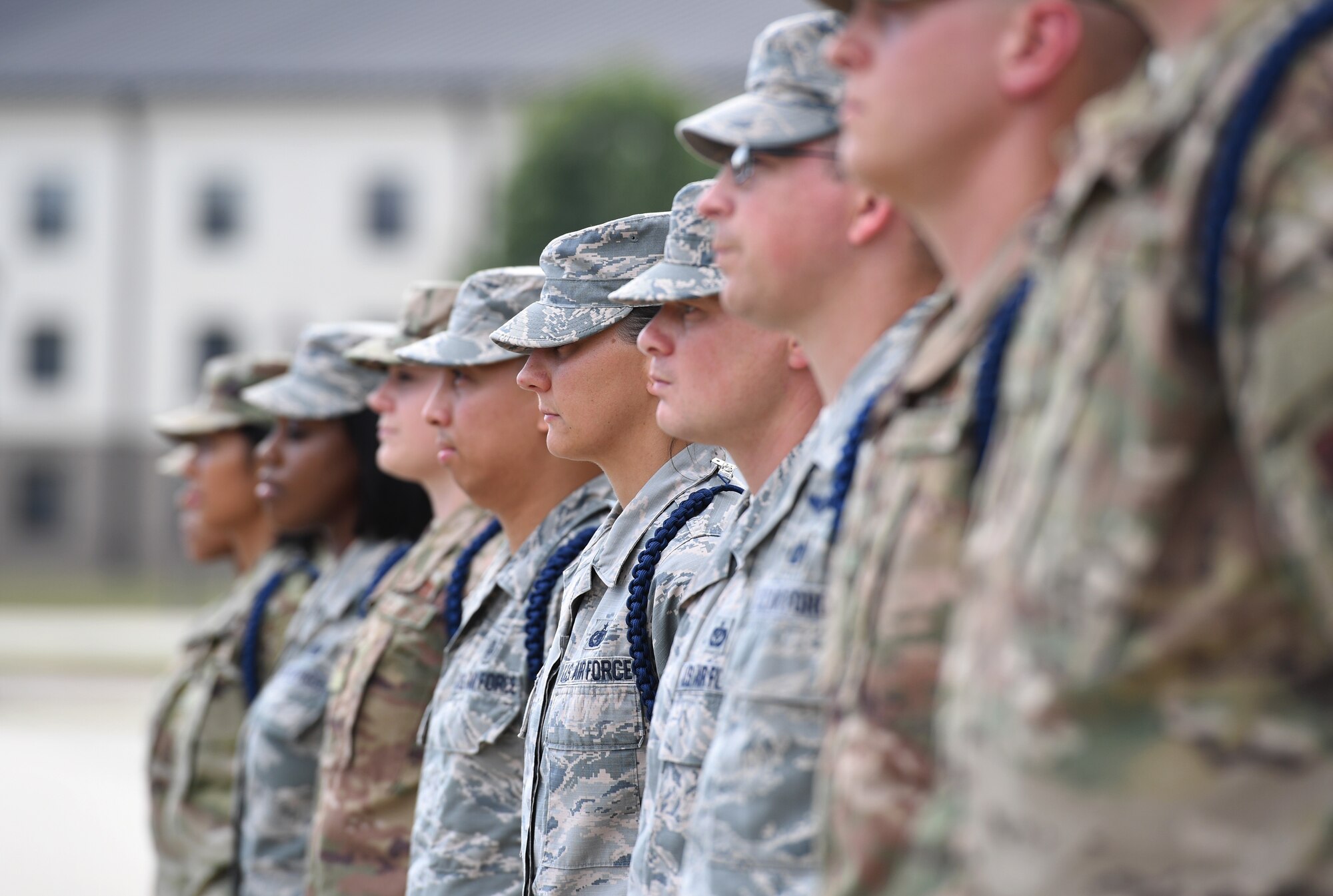 Airmen stand in formation during a Military Training Leader course graduation ceremony at the Levitow Training Support Facility on Keesler Air Force Base, Mississippi, May 30. The MTL course is responsible for training approximately 120 MTLs per year. Those MTLs are then responsible for training approximately 30,000 Airmen in 49 different locations that fall under Air Education and Training Command.