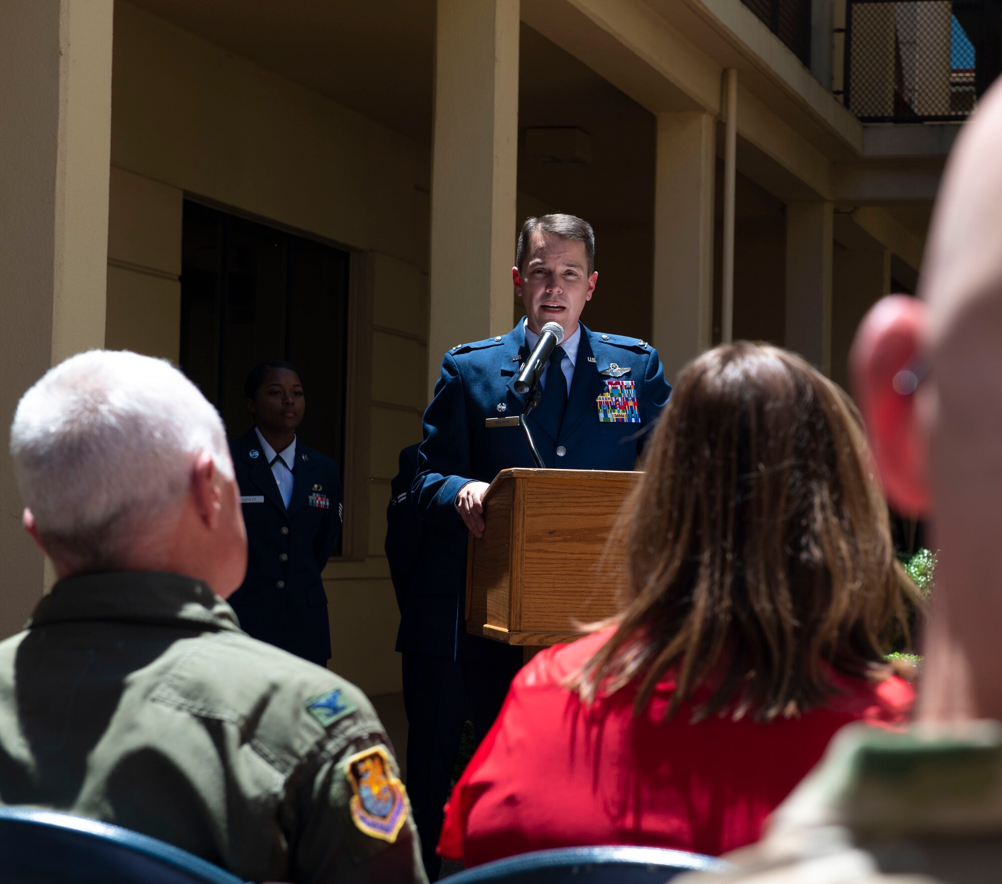 U.S. Air Force Col. Jeff Nelson, 60th Air Mobility Wing commander, gives opening remarks for the 60th Comptroller Squadron Change of Command June 28, 2019, at Travis Air Force Base, California. Lt. Col. Jared Mitchell pass the reigns of command to Maj. Andrew Wilkins. (U.S. Air Force photo by Airman 1st Class Jonathon Carnell)