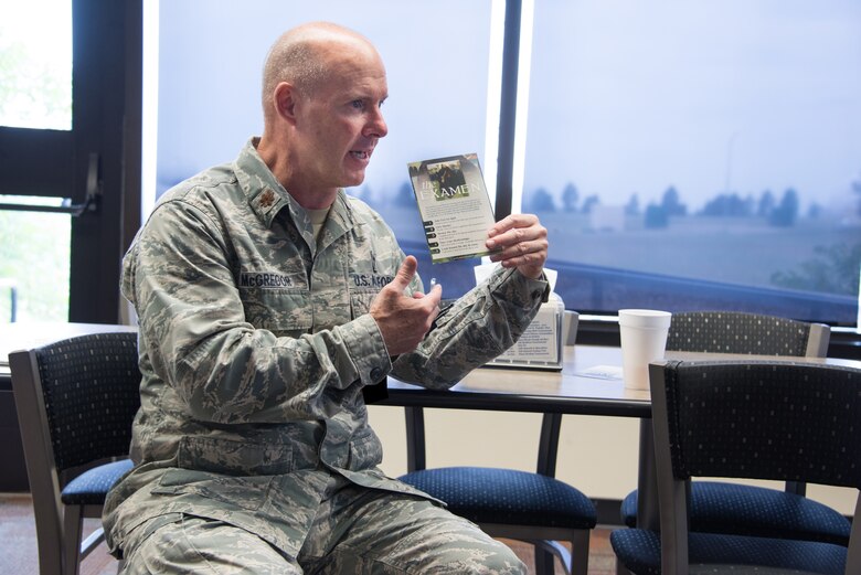 Maj. Mark McGregor, 50th Space Wing chaplain, talks about the examen during the 50th SW chaplain’s office hosted Lunch-n-Learn at the Dish dining facility at Schriever Air Force Base, Colorado, June 26, 2019. Attendees were encouraged to bring their own lunch to the meeting where they learned the five steps of the examen, a prayerful method that helps individuals examine their day in the presence of God (or by means of spirituality). (U.S. Air Force photo by 2nd Lt. Idalí Beltré Acevedo)