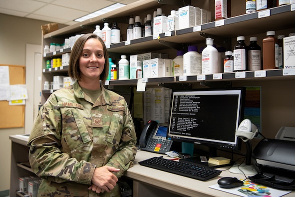 Pharmacist poses for a photo