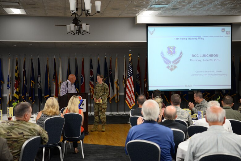 Col. Samantha Weeks, 14th Flying Training Wing commander, and Chuck Bigelow, Base Community Council president, discuss the importance of community relations between BCC members and Airmen, June 20, 2019, on Columbus Air Force Base, Mississippi. The BCC is a multi-community organization that focuses on connecting civilian communities to Air Force Bases. (U.S. Air Force photo by Airman 1st Class Jake Jacobsen