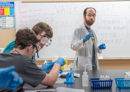 Dan Flisek, physicist at the Naval Surface Warfare Center Panama City Division teaches Science, Technology, Engineering and Mathematics (STEM) Summer Camp students about how chemistry relates to local water samples affected by last year’s Category 5 Hurricane Michael. Flisek revealed to students, with a water-quality report, pollutants found in local water reservoirs from the storm’s aftermath.