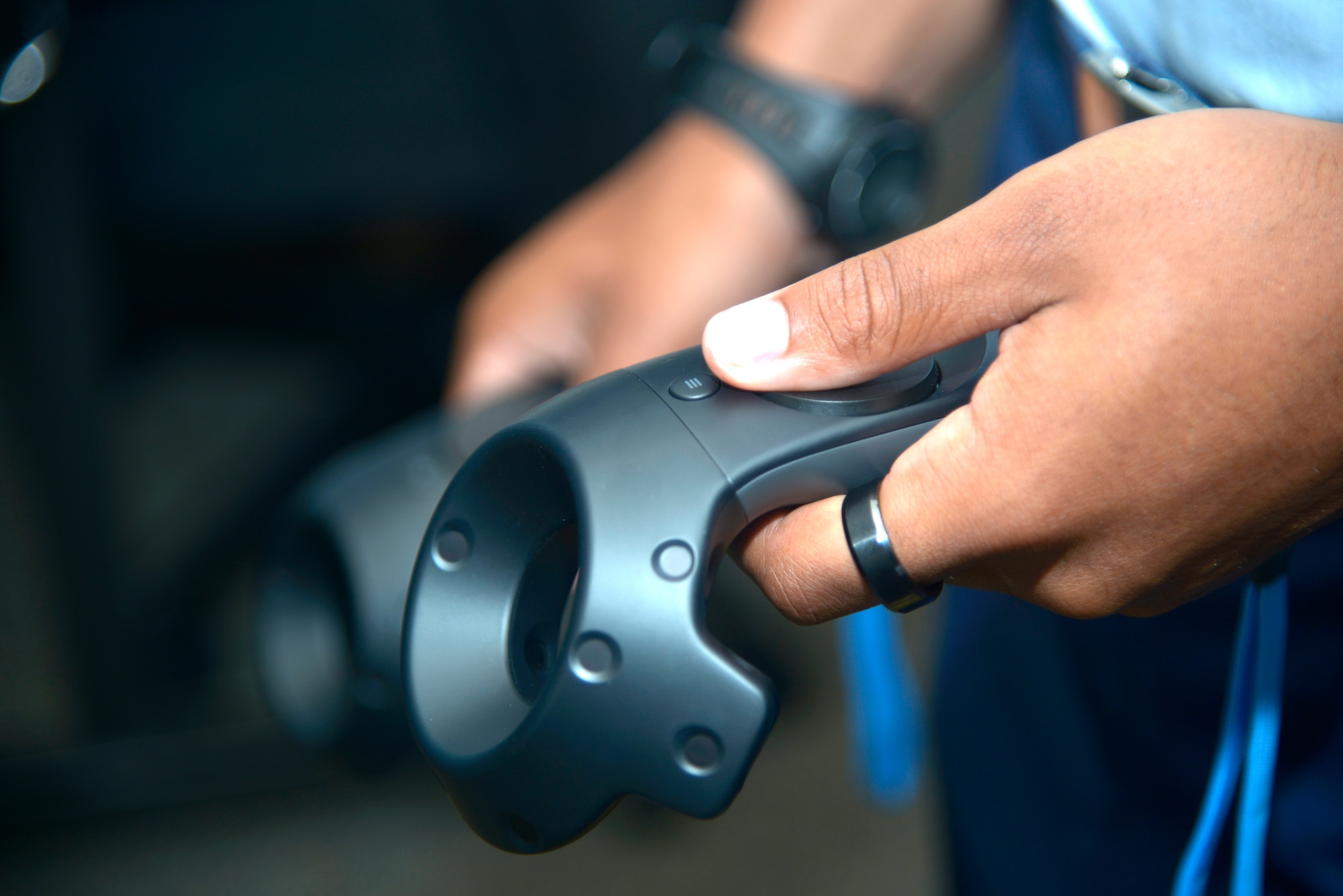 An Airman from the 334th Training Squadron tries out new virtual reality technology of the 334th TRS at Cody Hall, on Keesler Air Force Base, Mississippi, June 28, 2019. The 334th TRS incorporated a VR classroom to teach Airfield Maintenance more efficiently with visual simulation. (U.S. Air Force photo by Airman Seth Haddix)