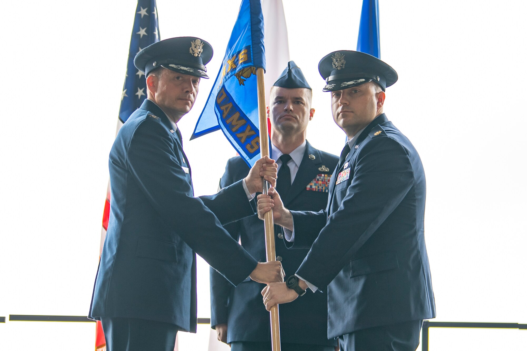 Maj. Larry Sepassi (right) accepts the guidon of the 753rd Special Operations Aircraft Maintenance Squadron at Yokota Air Base, Japan, July 1, 2019.