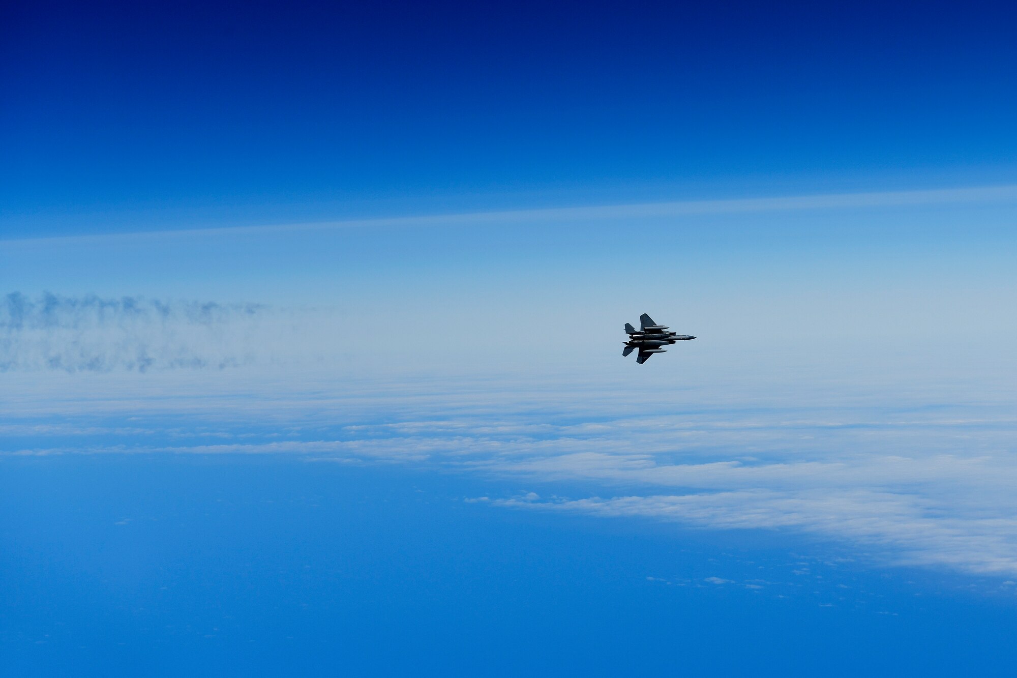 An F-15C Eagle assigned to the 493rd Fighter Squadron conducts basic fighter maneuvers in support of exercise Pointblank 19-2, over the Nprth Sea, June 27, 2019. The objective of the exercise is to prepare coalition warfighters for a highly contested fight against near-peer adversaries by providing a multi-dimensional battle-space to conduct advanced training in support of US, UK and French national interests. (U.S. Air Force photo/ Tech. Sgt. Matthew Plew)