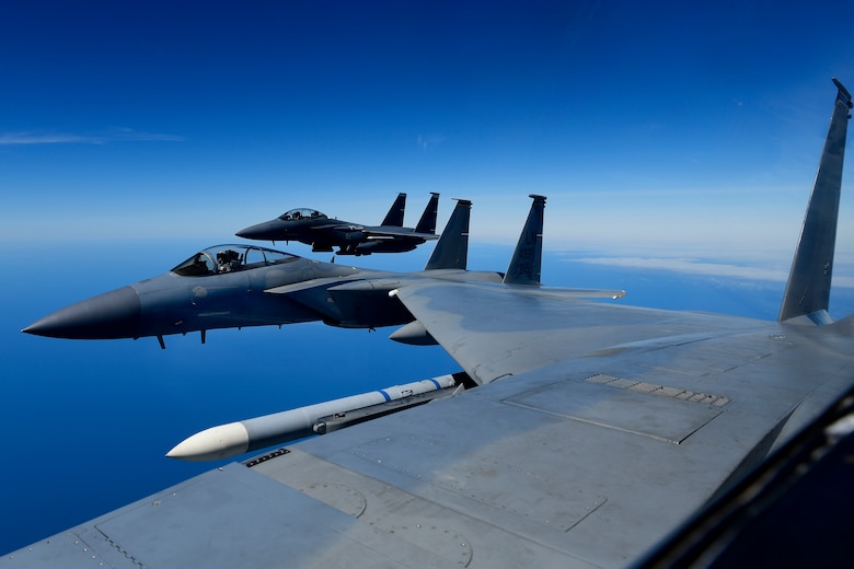 F-15 aircraft assigned to the 48th Fighter Wing conduct aerial operations in support of exercise Pointblank 19-2, over the North Sea, June 27, 2019. The objective of the exercise is to prepare coalition warfighters for a highly contested fight against near-peer adversaries by providing a multi-dimensional battle-space to conduct advanced training in support of US, UK and French national interests. (U.S. Air Force photo/ Tech. Sgt. Matthew Plew)