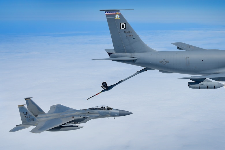 An F-15C Eagle assigned to the 493rd Fighter Squadron conducts in-flight refueling operations with a KC-135 Stratotanker from the 100th Air Refueling Wing in support of exercise Pointblank 19-2, over the North Sea, June 27, 2019. The objective of the exercise is to prepare coalition warfighters for a highly contested fight against near-peer adversaries by providing a multi-dimensional battle-space to conduct advanced training in support of US, UK and French national interests. (U.S. Air Force photo/ Tech. Sgt. Matthew Plew)