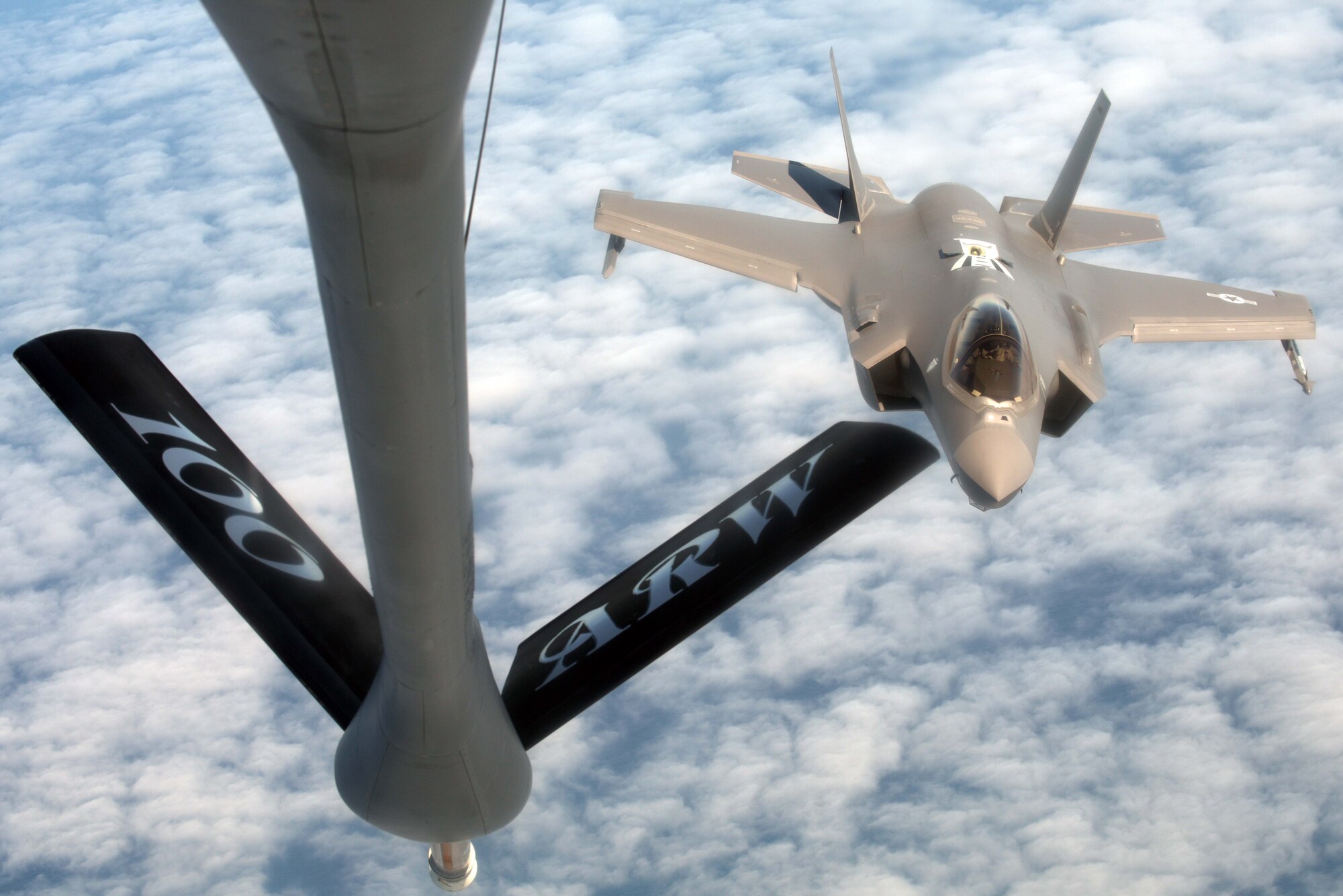 A U.S. Air Force F-35A Lightning II, assigned to the 388th Fighter Wing, prepares to receive fuel from a U.S. Air Force KC-135 Stratotanker, assigned to RAF Mildenhall, England, during Exercise Point Blank over the North Sea, June 27, 2019. Approximately 52 aircraft from three nations, U.S., France and the UK, participated in Exercise Point Blank. This exercise was a perfect opportunity for aircraft to train alongside other types of allied aircraft in a realistic training environment. (U.S. Air Force photo by Senior Airman Benjamin Cooper)