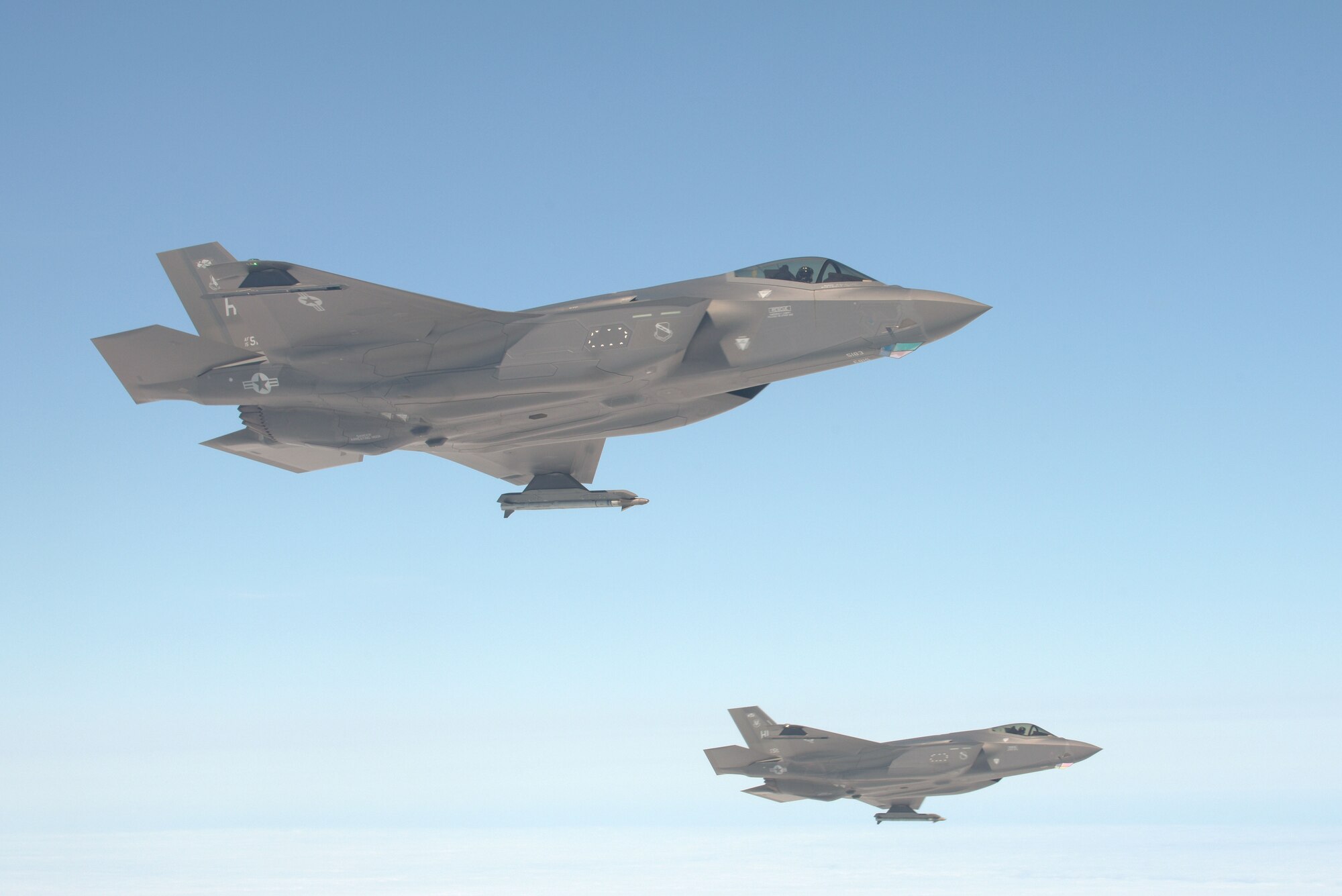 U.S. Air Force F-35A Lightning IIs, assigned to the 388th Fighter Wing, fly alongside a U.S. Air Force KC-135 Stratotanker, assigned to RAF Mildenhall, England, during Exercise Point Blank over the North Sea, June 27, 2019. Exercise Point Blank included fourth and fifth-generation integration of air interdiction, offensive counter air, personnel recovery, dissimilar air combat maneuvering, along with planning and assessment. (U.S. Air Force photo by Senior Airman Benjamin Cooper)
