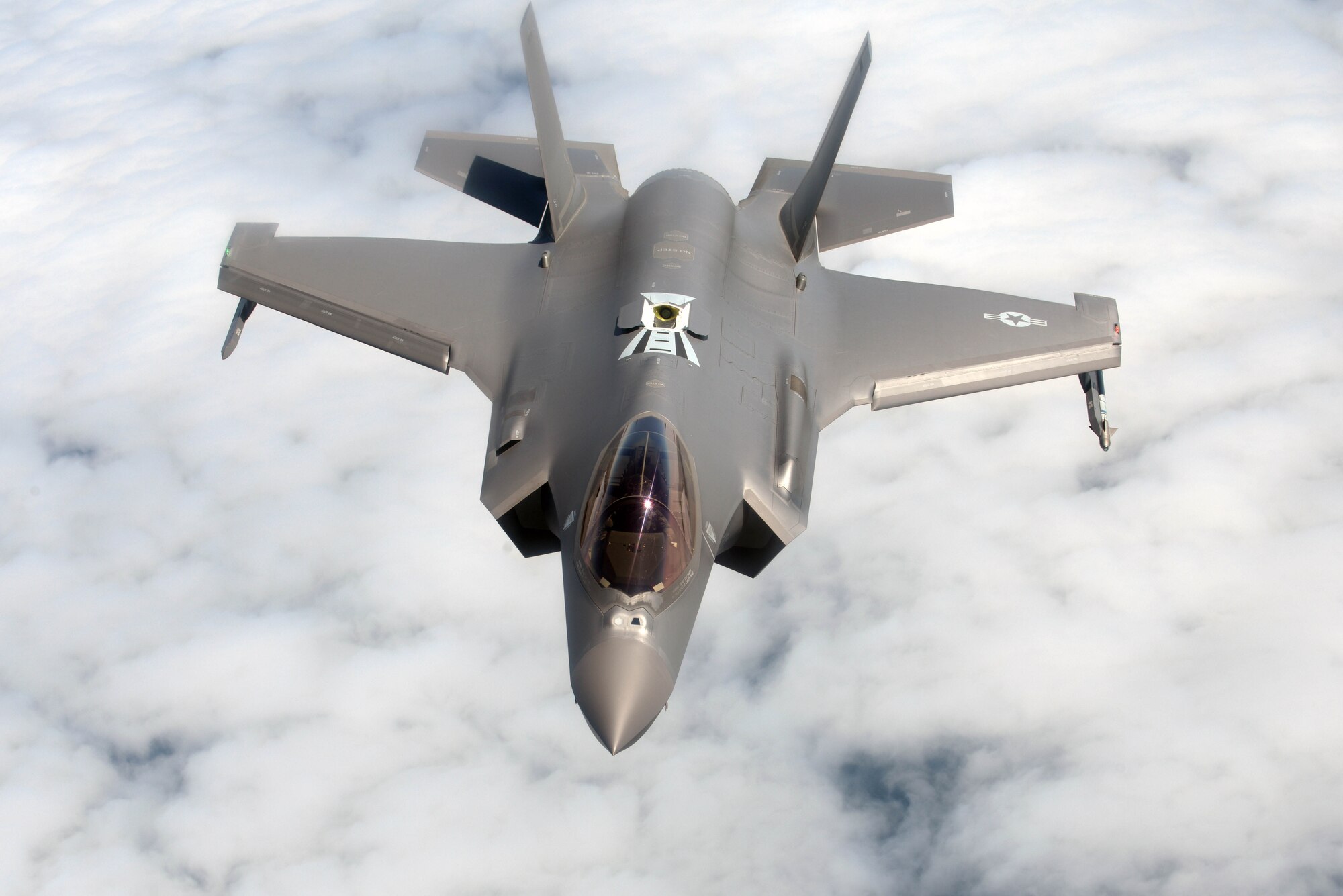 A U.S. Air Force F-35A Lightning II, assigned to the 388th Fighter Wing, descends below a U.S. Air Force KC-135 Stratotanker, assigned to RAF Mildenhall, England, during Exercise Point Blank over the North Sea, June 27, 2019. Training with joint partners, allied nations, and other U.S. Air Force units contributes to our ready and postured forces and enables us to build enduring and strategic relationships necessary to confront a broad range of global challenges. (U.S. Air Force photo by Senior Airman Benjamin Cooper)