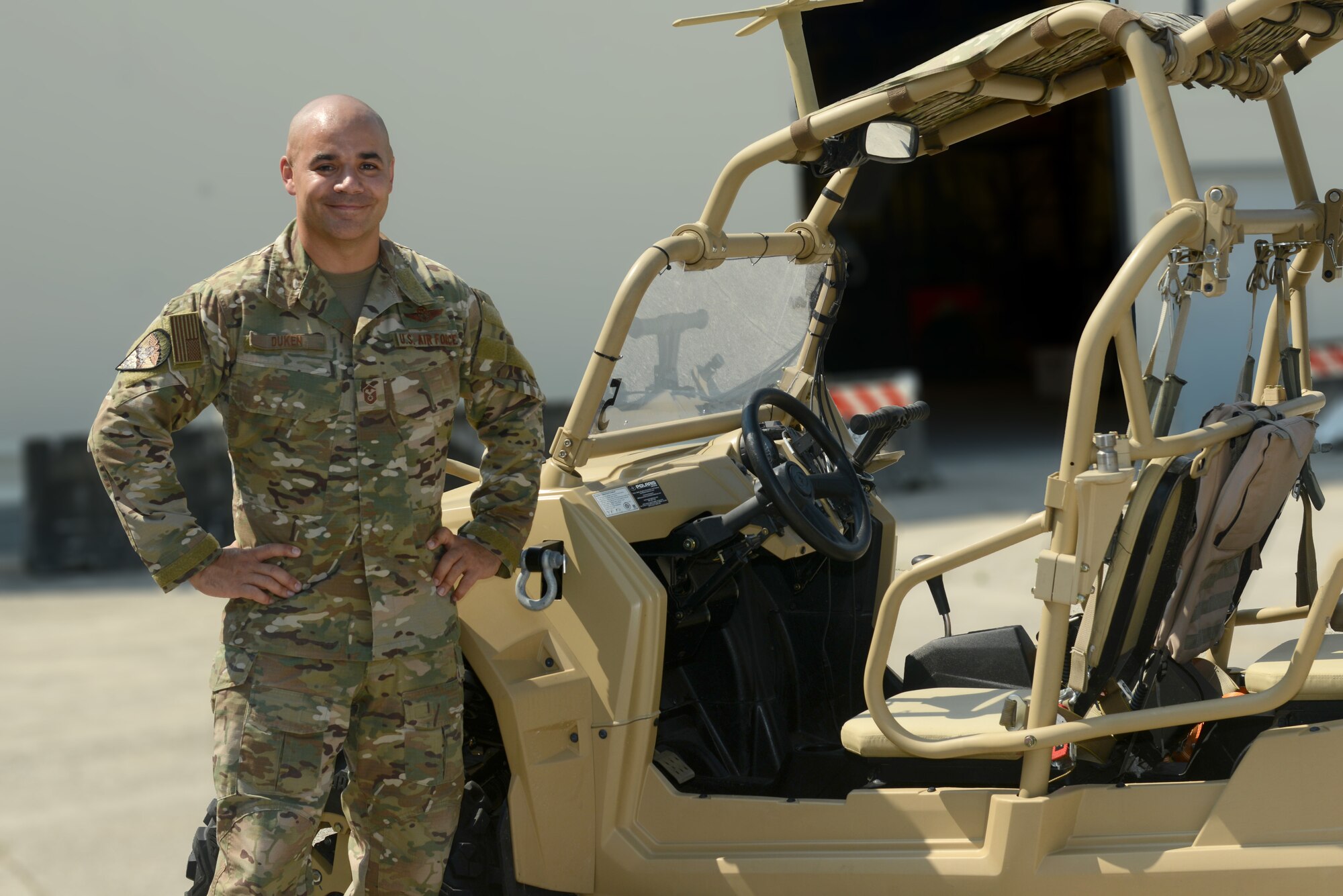 U.S. Air Force Master Sgt. Richard Duken, first sergeant of the 57th Rescue Squadron, poses for a photo next to a Military Razor vehicle at Aviano Air Base, Italy, June 25, 2019. The 57th Rescue Squadron leads, organizes, trains and equips Guardian Angel weapons system and combat support teams to conduct day and night personnel recovery operations in combat. (U.S. Air Force photo by Airman 1st Class Ericka A. Woolever).