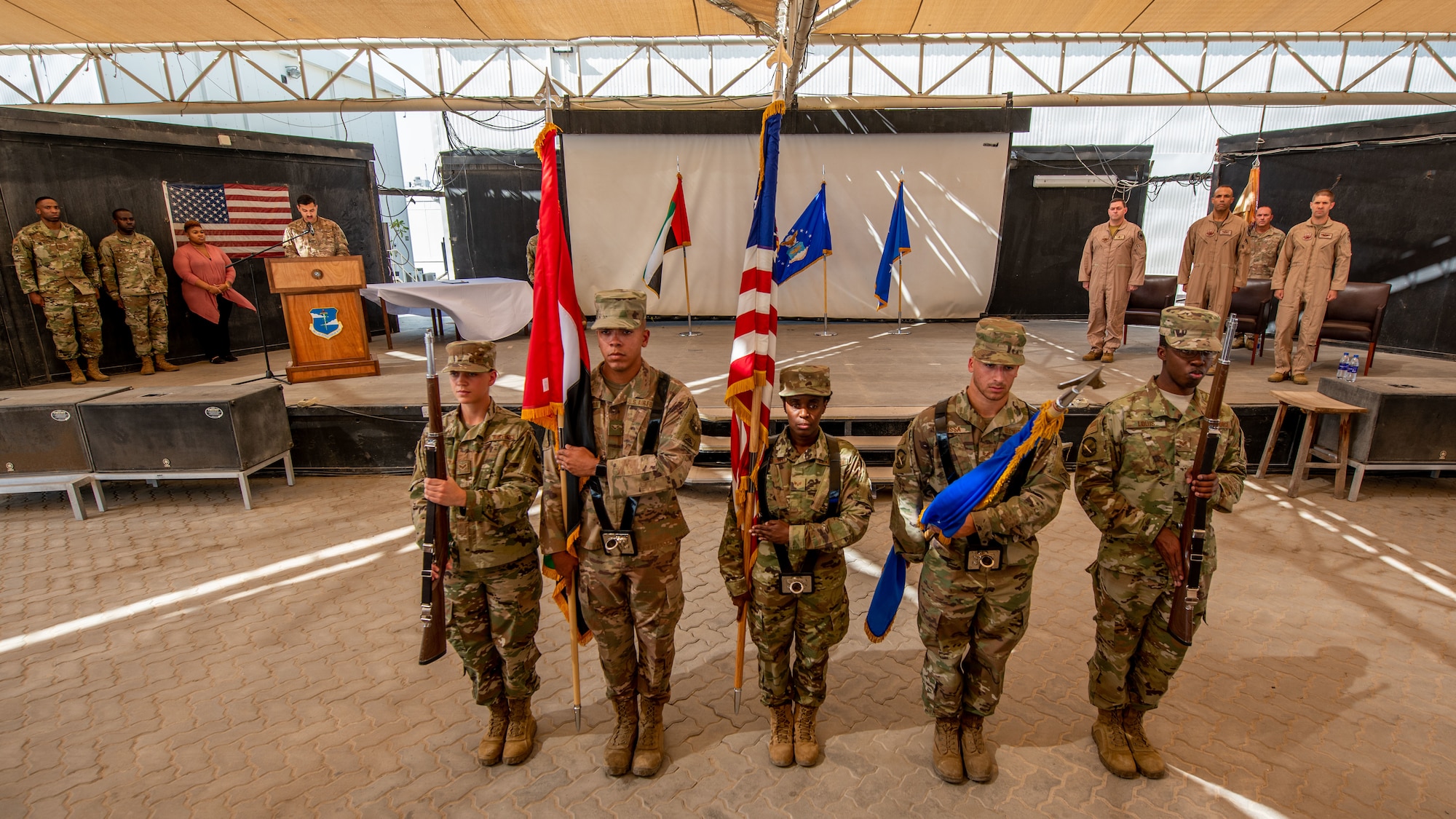 The 380th Air Expeditionary Wing Honor Guard presents the colors during the change of command ceremony July 1, 2019, at Al Dhafra Air Base, United Arab Emirates.