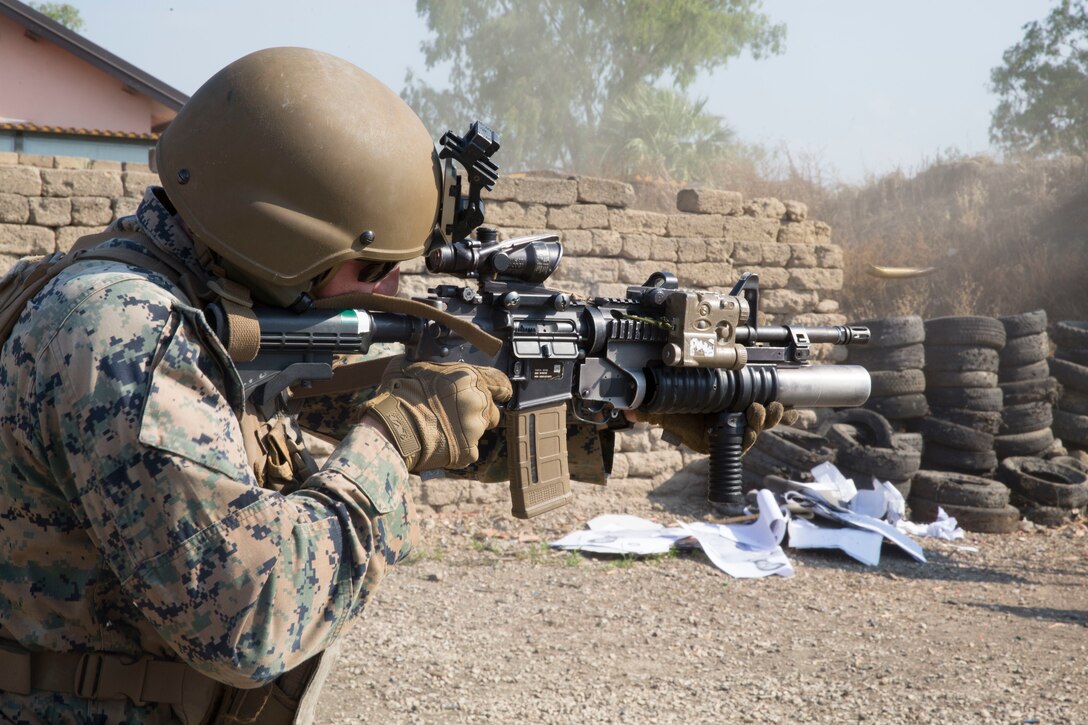 A U.S. Marine with Special Purpose Marine Air-Ground Task Force-Crisis Response-Africa 19.2, Marine Forces Europe and Africa, fires his M4 carbine at the Etna Range, Catania, Italy, June 28, 2019. SPMAGTF-CR-AF is deployed to conduct crisis-response and theater-security operations in Africa and promote regional stability by conducting military-to-military training exercises throughout Europe and Africa. (U.S. Marine Corps photo by Staff Sgt. Mark E. Morrow Jr.)