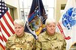 Lt. Col. Lynn Currier, an information management branch manager, and Master Sgt. Lisa Currier, a senior logistics officer, assigned to the New York National Guard Headquarters, prepare for Lynn's retirement from the New York National Guard during a ceremony last month in Latham, N.Y. The two sisters began their military careers together in 1986 when they enlisted into the Vermont Army National Guard before transferring to the New York National Guard in the early 1990s.