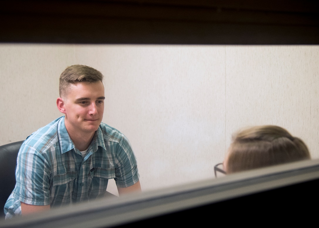 Investigator Taylor Cyr, left, from the 23d Security Forces Squadron, interrogates a suspect during crime scene investigation training, June 26, 2019, at Moody Air Force Base, Ga. After gathering the facts and evidence from a crime scene, investigators will locate and apprehend the suspect and then interrogate them. During interrogation, investigators will question the suspect on the particular incident to get their side of the story to help determine if a crime was committed. (U.S. Air Force photo by Airman 1st Class Eugene Oliver)