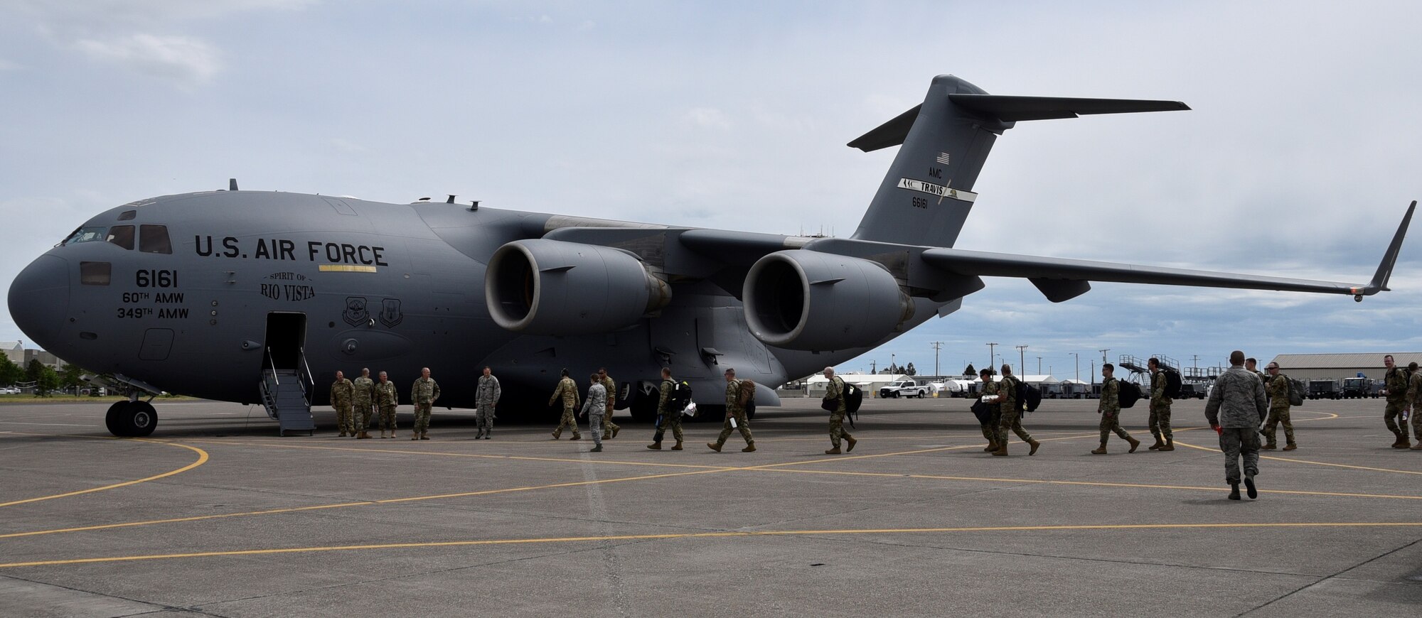 Airmen from the 120th Airlift Wing board a C-17 from Travis Air Force Base June 28, 2019 that took them to Southwest Asia. Approximately 130 Airmen and four C-130s will spend four months on this deployment.