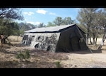 One of the four 20 by 30 foot wall tents the US Forest Service obtained from DLA Disposition Services offers housing for the Youth Conservation Corps at the Coronado National Forest in southern Arizona.