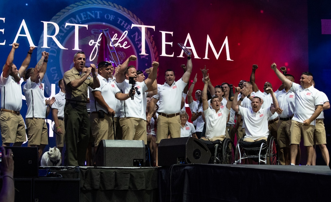 U.S. Marine Corps Gunnery Sgt. Raymond Archer is awarded the “Heart of the Team” award at the 2019 DoD Warrior Games closing ceremony in Tampa, Florida, June 30. Lt. Gen. Michael Rocco, Deputy Commandant for Manpower and Reserve Affairs, presented the award. The DoD Warrior Games were established in 2010 as a way to enhance the recovery and rehabilitation of wounded, ill or injured service members and veterans and to expose them to adaptive sports.