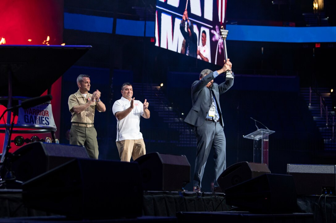 The 2019 DoD Warrior Games ends with the passing of the torch at Amalie Arena, Tampa, Florida, June 30, 2019. Next year’s games will be hosted by the U.S. Marine Corps and held in San Antonio, Texas. The 2019 Warrior Games consist of 13 Paralympic-style sports, and more than 300 athletes representing the U.S. Marine Corps, Army, Navy, Air Force, Special Operations Command, and five international teams.