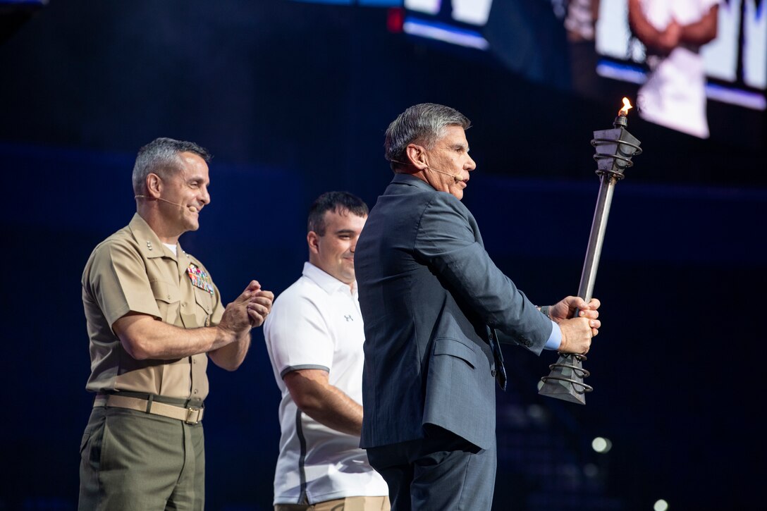 The 2019 DoD Warrior Games end with the passing of the torch at the game’s closing ceremony at Amalie Arena, Tampa, Florida, June 30, 2019. Lt. Gen. Michael Rocco, Deputy Commandant for Manpower & Reserve Affairs,  received the torch with Maj. Gen. Juan Ayala (Ret), City of San Antonio Director of Military Affairs, to signify the Marine Corps’ partnership with San Antonio.. Next year’s games will be hosted by the U.S. Marine Corps in San Antonio, Texas. The DoD Warrior Games were established in 2010 as a way to enhance the recovery and rehabilitation of wounded, ill or injured service members and veterans and to expose them to adaptive sports.