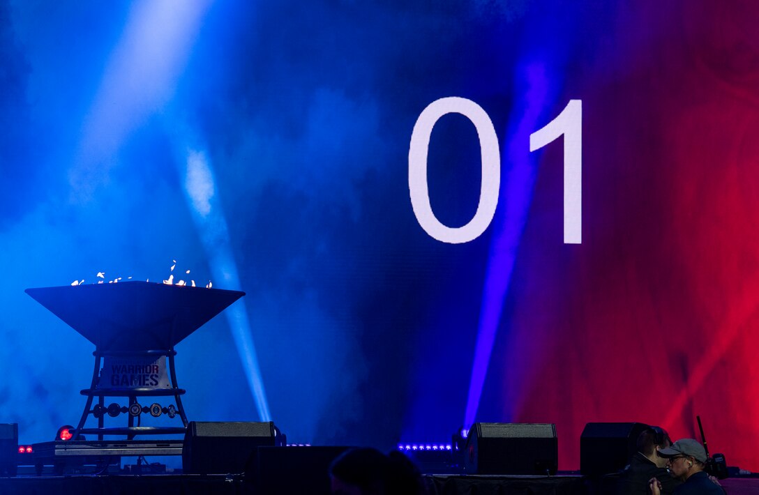 The count down to the closing ceremony comes to an end as the cauldron burns on stage at the 2019 DoD Warrior Games closing ceremony at Amalie Arena, Tampa, Florida, June 22, 2019. The 2019 Warrior Games consist of 13 Paralympic-style sports, and more than 300 athletes representing the U.S. Marine Corps, Army, Navy, Air Force, Special Operations Command, and five international teams.