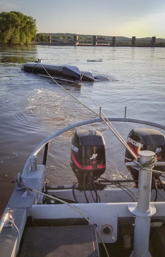 boat tows damaged pontoon