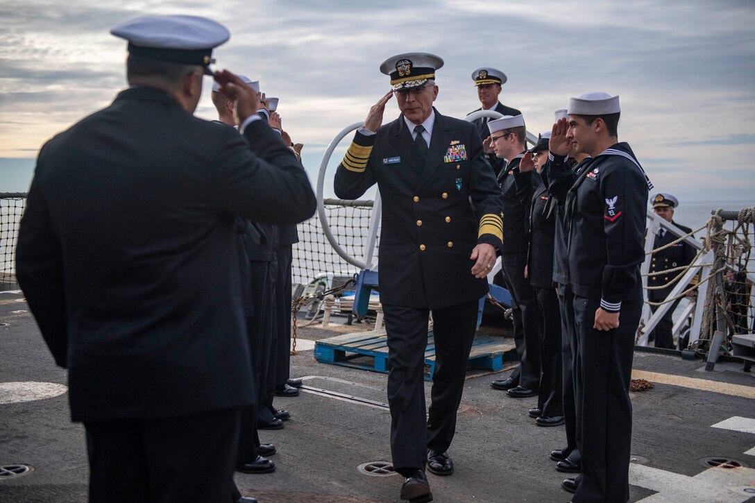 Adm. Craig S. Faller, commander, U.S. Southern Command, is welcomed aboard USS Michael Murph.