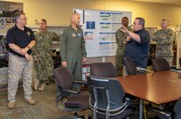 Air Force Conventional Forces Coordinator and Director of Operations, Headquarters Air Combat Command, Joint Base Langley-Eustis, Va., Air Force Maj. Gen. Kevin Huyck is briefed by Deputy Director of Operations Kenneth Lucas at Joint Task Force Civil Support (JTF-CS), during a visit to the command’s headquarters. JTF-CS employs conventional Air Force forces such as the Air Force Radiological Assessment Team, combat camera, the Expeditionary Medical Support (EMEDS), and the Rapid Engineer Deployable Heavy Operational Repair Squadron Engineers (REDHORSE). When directed, JTF-CS is ready to respond in 24 hours to provide command and control of 5,200 federal military forces located at more than 36 locations throughout the nation in support of civil authority response operations to save lives, prevent further injury and provide critical support to enable community recovery. (Official DoD photo by Mass Communication Specialist 3rd Class Michael Redd/released)