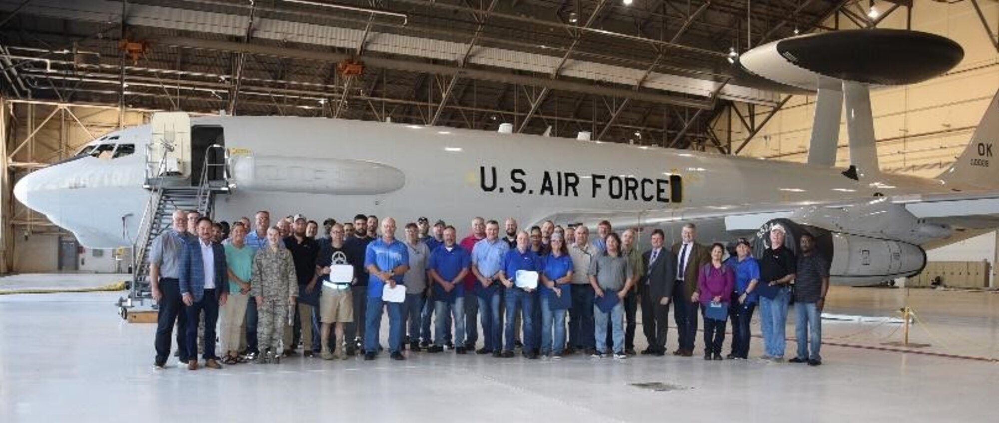 Recognition of personnel working on the Internet Protocol Enabled Communications modification program for the Boeing E-3 Sentry Airborne Warning and Control System aircrafts took place in the 552nd Air Control Wing's maintenance spaces during a ceremony June 24, 2019, Tinker Air Force Base, Oklahoma. Senior military and contractor leaders recognized key personnel for their outstanding contributions to providing critical capability to the warfighter. (U.S. Air Force photo/Greg L. Davis)