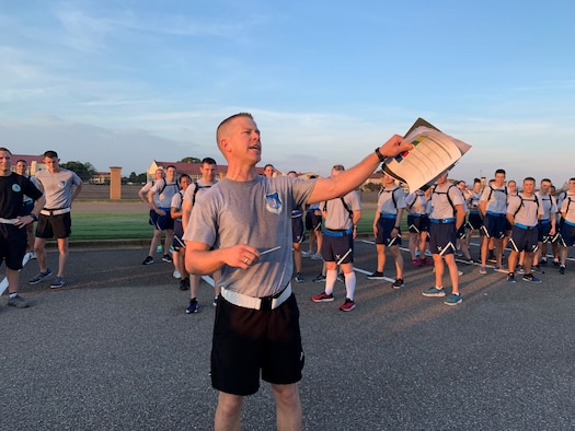 Capt. Dan Hochhalter, Officer Training School instructor, shouts to trainees during a physical training session at Maxwell Air Force Base, Alabama.
