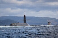 HER MAJESTY’S NAVAL BASE CLYDE, Scotland (July 2, 2018) The Ohio-class ballistic missile submarine USS Alaska (SSBN 732) arrives at Her Majesty’s Naval Base Clyde, Scotland, for a scheduled port visit July 2, 2019. The port visit strengthens cooperation between the United States and United Kingdom, and demonstrates U.S. capability, flexibility, and continuing commitment to NATO allies.
