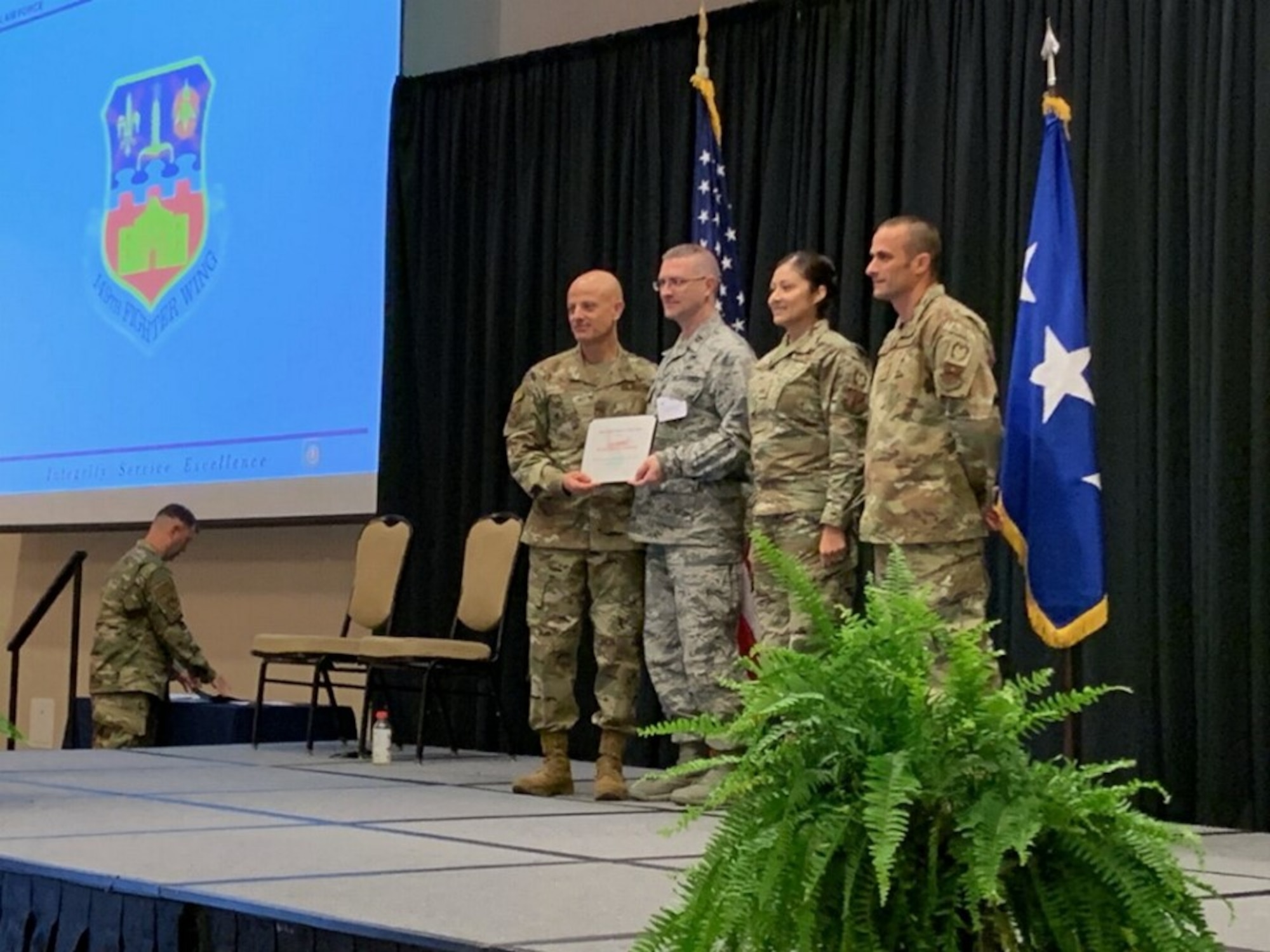 149 IG team receives award from the AETC commander.