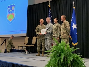 149 IG team receives award from the AETC commander.