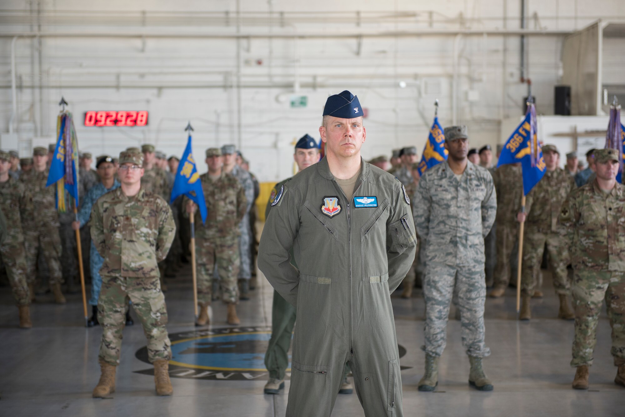 Col. Kurt Helphinstine, 366th Fighter Wing deputy commander of operations, stands at attentinon at the 366th FW change of command ceremony July 2, 2019, at Mountain Home Air Force Base, Idaho. During the ceremony Col. Richard Goodman, 366th FW commander, took command of the 366th FW. (U.S. Air Force photo by Senior Airman Tyrell Hall)
