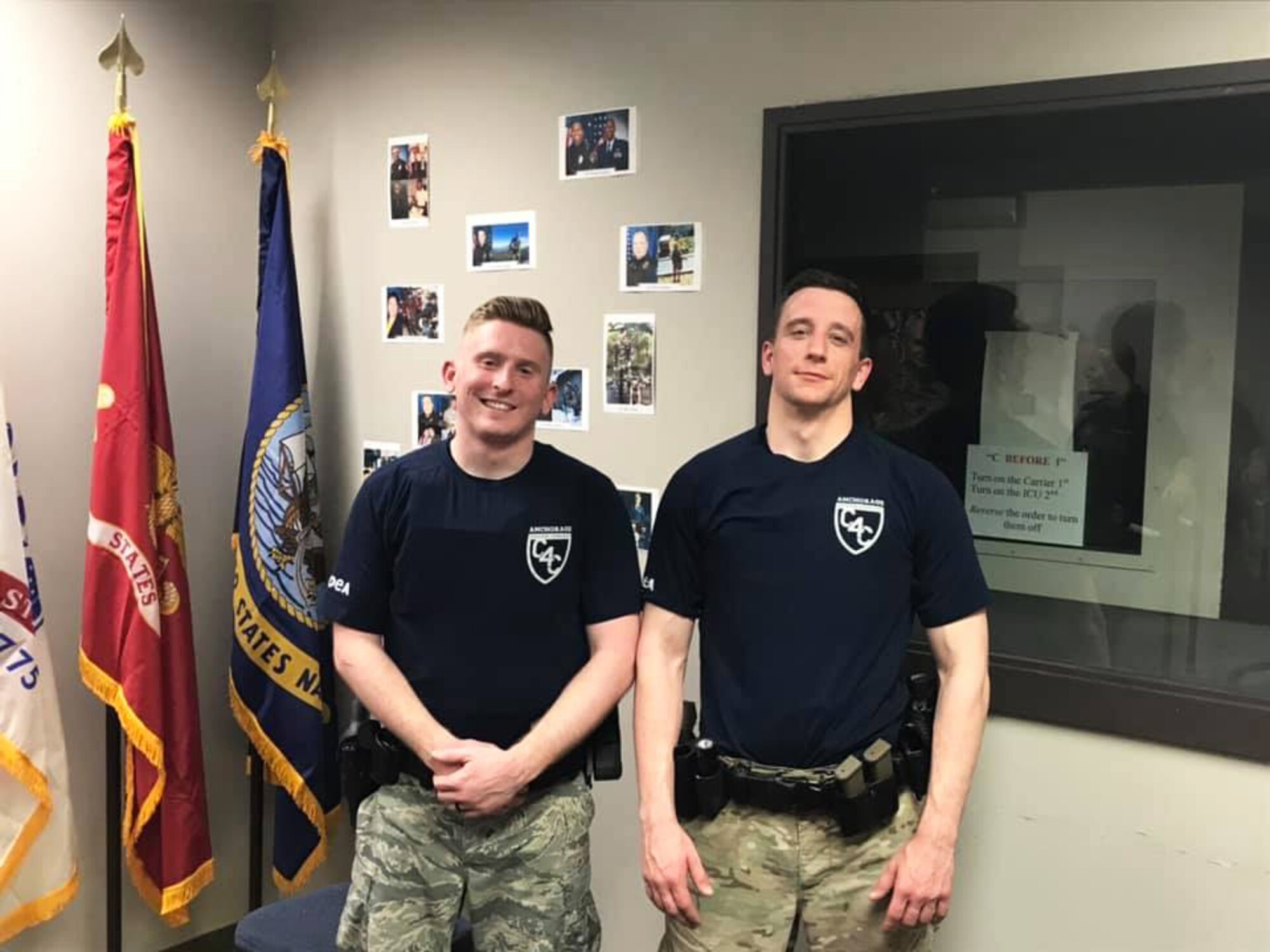 U.S. Air Force Staff Sgt. Jacob Sleik (right), and Senior Airman Joshua Worley, 673d Security Forces Squadron patrolmen, pose for a photo at Anchorage Police Department Officer’s Academy, May 6, 2019. Both Airmen were the first 673d SFS members to attend and graduate from the academy.