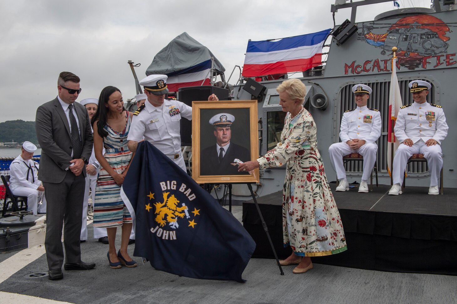Cindy McCain, the ship’s sponsor of USS John S. McCain (DDG 56) and wife of late Sen. John S. McCain III, is presented with a painting of her husband during the 25th anniversary of the ship’s commissioning, July 2, 2019 at Commander, Fleet Activities Yokosuka, Japan. McCain was commissioned on July 2, 1994 in Bath, Maine and was originally named in honor of Admirals John S. McCain Sr. and Jr. In a rededication ceremony on July 12, 2018 the late Sen. John S. McCain III was officially added to the namesake.