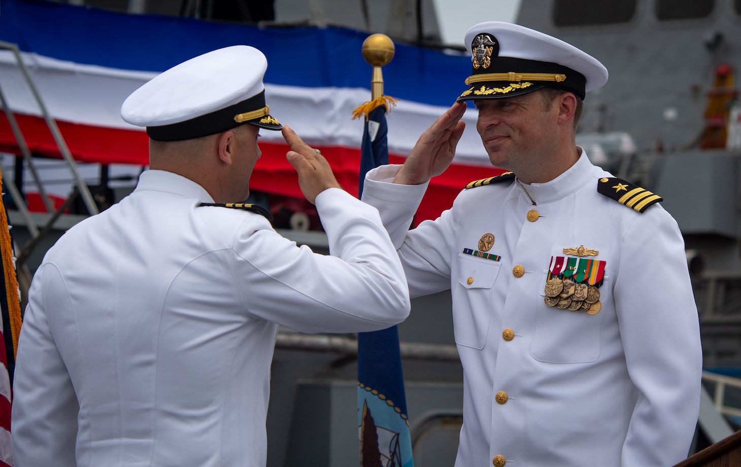 Cmdr. Ryan T. Easterday assumes command of USS John S. McCain (DDG 56) from Cmdr. Micah D. Murphy during a change of command ceremony, July 2, 2019 at Commander, Fleet Activities Yokosuka, Japan. McCain was commissioned on July 2, 1994 in Bath, Maine and was originally named in honor of Admirals John S. McCain Sr. and Jr. In a rededication ceremony on July 12, 2018 the late Sen. John S. McCain III was officially added to the namesake.