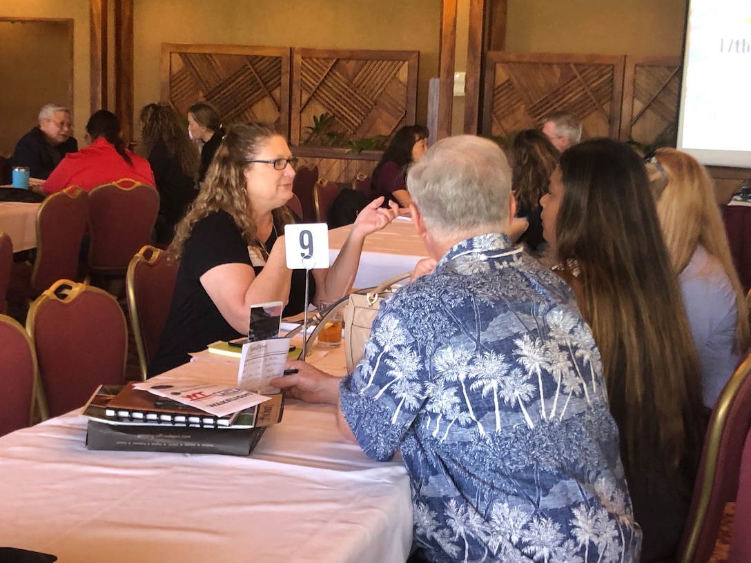 Honolulu District Chief Of Small Business Regina Pasqualucci discuses small business opportunities June18, 2019 during fast-paced face-to-face meetings, similar to speed dating, allowing prime contractors and potential subcontractors discuss capabilities and subcontracting opportunities during the 17th Annual Hawaii Small Business Forum.
