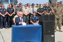 Mark Ezzell, director of the Governor’s Highway Safety Program, speaks during the 2019 Fourth of July ‘Booze it & Lose it’ event, code-named Operation Firecracker on Marine Corps Air Station New River, July 1, 2019. The event featured speakers from the air station and local law enforcement. The goal of the event was to eliminate preventable loss of life on North Carolina roadways by discouraging driving while impaired and encouraging the public to use other safe options like ride sharing and commercial transportation. This is the first time the event has been held at Marine Corps Air Station New River, which was chosen to be the backdrop due to the large concentration of young male adults who are considered to be the most at-risk age group. (U.S. Marine Corps photo by Sgt. Jonathan Sosner)