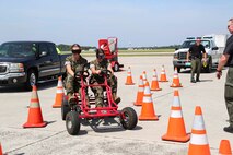 U.S. Marines participate in a simulated drunk driving exercise during the 2019 Fourth of July ‘Booze it & Lose it’ event, code-named Operation Firecracker on Marine Corps Air Station New River, July 1, 2019. The event featured speakers from the air station and local law enforcement. The goal of the event was to eliminate preventable loss of life on North Carolina roadways by discouraging driving while impaired and encouraging the public to use other safe options like ride sharing and commercial transportation. This is the first time the event has been held at Marine Corps Air Station New River, which was chosen to be the backdrop due to the large concentration of young male adults who are considered to be the most at-risk age group. (U.S. Marine Corps photo by Sgt. Jonathan Sosner)