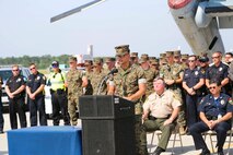 U.S. Marine Lance Cpl. Brandon Pena, an aviation operations specialist, speaks about how his life has been impacted by drunk driving during the 2019 Fourth of July ‘Booze it & Lose it’ event, code-named Operation Firecracker on Marine Corps Air Station New River, July 1, 2019. The event featured speakers from the air station and local law enforcement. The goal of the event was to eliminate preventable loss of life on North Carolina roadways by discouraging driving while impaired and encouraging the public to use other safe options like ride sharing and commercial transportation. This is the first time the event has been held at Marine Corps Air Station New River, which was chosen to be the backdrop due to the large concentration of young male adults who are considered to be the most at-risk age group. (U.S. Marine Corps photo by Sgt. Jonathan Sosner)