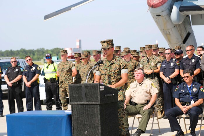 U.S. Marine Lance Cpl. Brandon Pena, an aviation operations specialist, speaks about how his life has been impacted by drunk driving during the 2019 Fourth of July ‘Booze it & Lose it’ event, code-named Operation Firecracker on Marine Corps Air Station New River, July 1, 2019. The event featured speakers from the air station and local law enforcement. The goal of the event was to eliminate preventable loss of life on North Carolina roadways by discouraging driving while impaired and encouraging the public to use other safe options like ride sharing and commercial transportation. This is the first time the event has been held at Marine Corps Air Station New River, which was chosen to be the backdrop due to the large concentration of young male adults who are considered to be the most at-risk age group. (U.S. Marine Corps photo by Sgt. Jonathan Sosner)