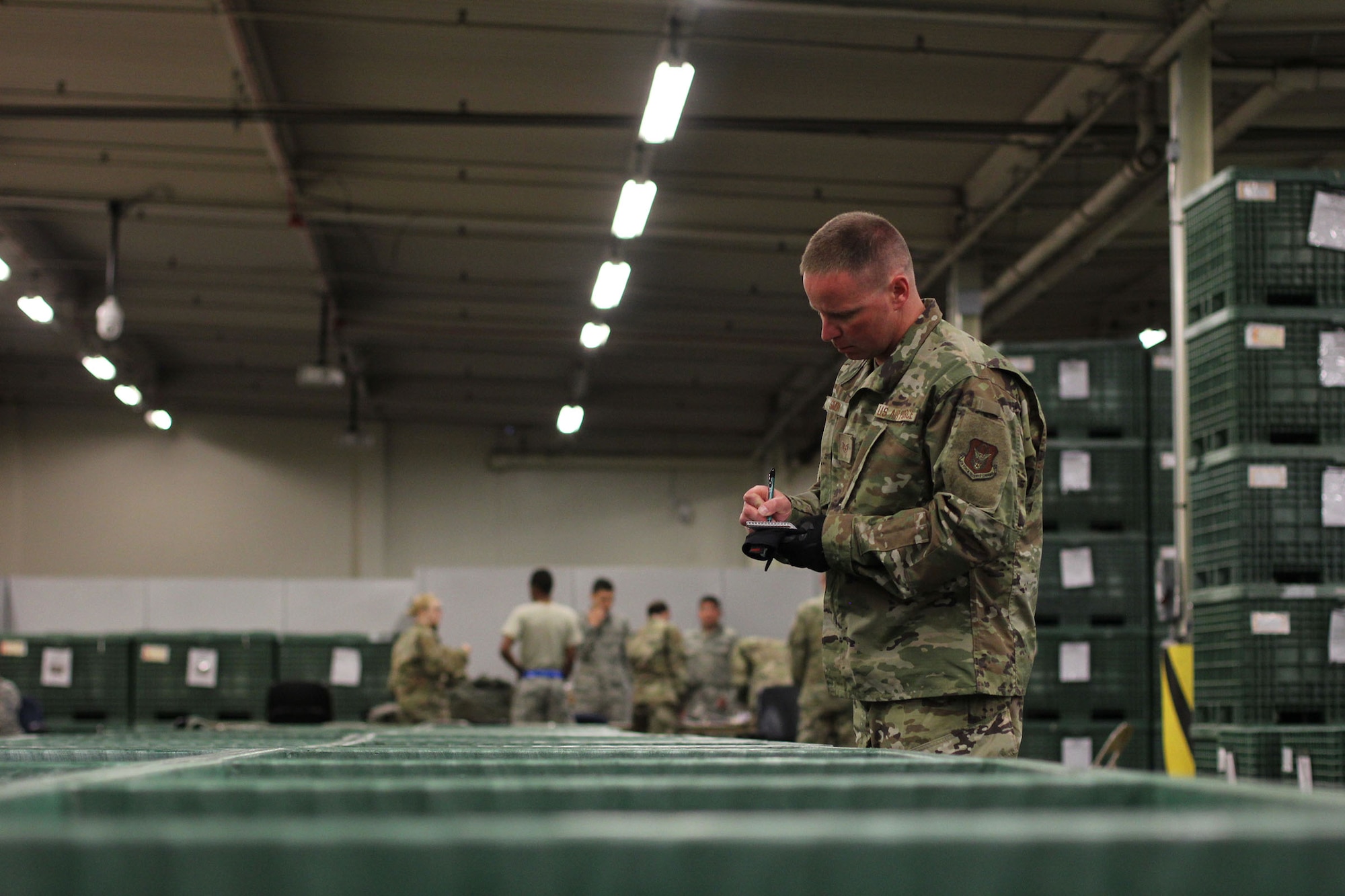 Staff Sgt. Zachary Simon, material management craftsmen with the 445th Logistics Readiness Squadron, takes inventory during a recent base exercise at Travis Air Force Base, Calif. Twenty two Reserve Citizen Airmen from the 445th LRS performed their annual tour at Travis AFB May 7-23, 2019.