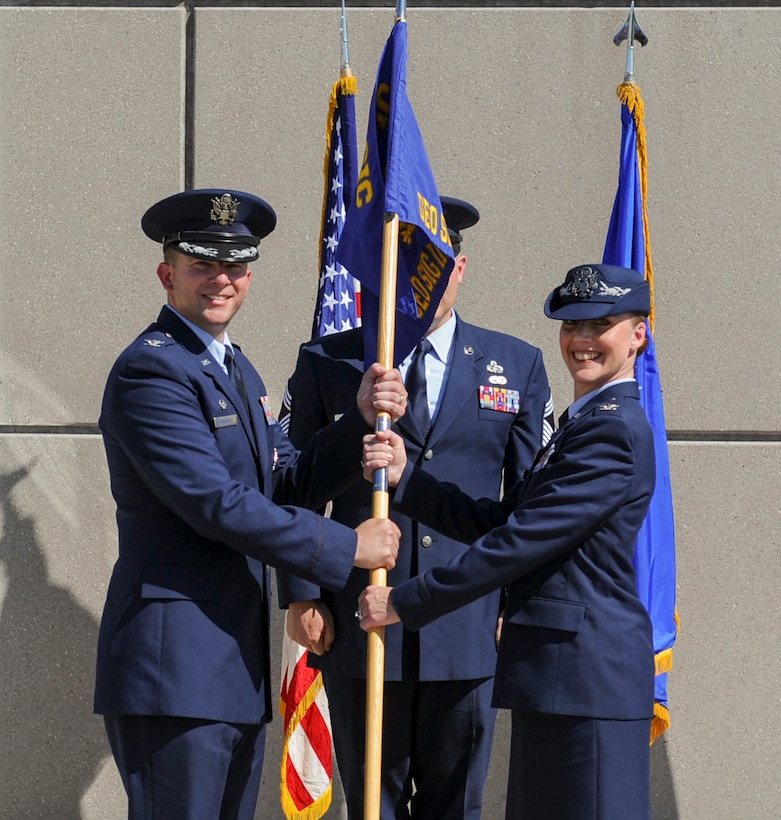 Col. Mary-Kathryn Haddad accepts command of the National Air and Space Intelligence Center’s Geospatial and Signatures Intelligence Group from Col. Parker Wright, NASIC commander, June 28. GS is responsible for creating Geospatial and Signatures Intelligence and innovate advanced capabilities to characterize objects, activities, and events to deliver decision advantage for the Air Force and the Nation.