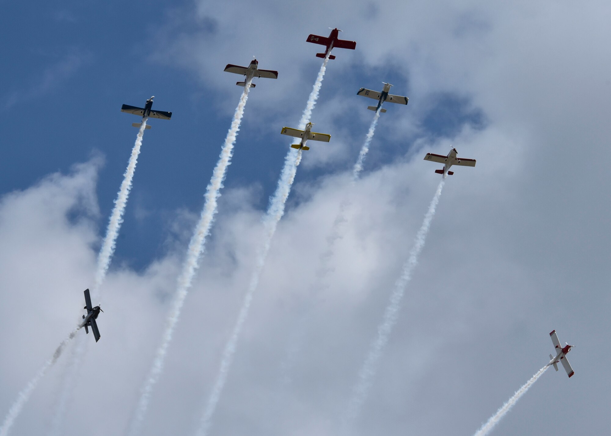 Retired U.S. Navy pilots, U.S. Air Force pilots, Reno Air Racers, acrobatics experts, and test pilots from the Lightning Formation Airshows demonstration team perform an aerial demonstration during the 2019 Skyfest Open House and Airshow  on Fairchild Air Force Base, Washington, June 22, 2019. Skyfest 2019 gave the Inland Northwest a chance to meet members of Team Fairchild and see the U.S. Air Force’s premier air refueling wing in action during a simulated KC-135 Stratotanker low-pass refuel of a C-17 Globemaster III. (U.S. Air Force photo by Airman Kiaundra Miller)