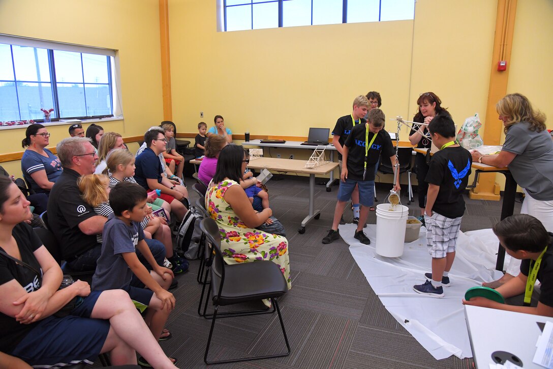 Students test boom lever’s they constructed during a LEGACY (Leadership Experience Growing Apprenticeships Committed to Youth) program camp June 28, 2019, at the Freeport Center in Clearfield, Utah. LEGACY is an Air Force program aimed at building interest in science, technology, engineering and math (STEM) through hands-on activities while showing how STEM applies to the world. (U.S. Air Force photo by Todd Cromar)